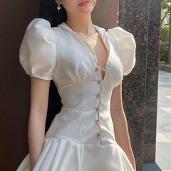 Ivory Ruffled Fishbone Dress