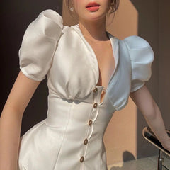 Ivory Ruffled Fishbone Dress