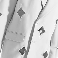 Blazer croisé asymétrique à col à revers et découpes en forme d'étoile à quatre branches