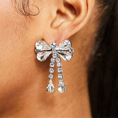 Boucles d'oreilles pendantes en forme de nœud avec strass plaqués - Argent