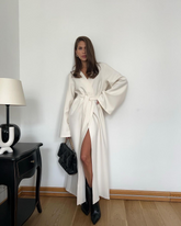 Slit-front long-sleeved tie-back dress