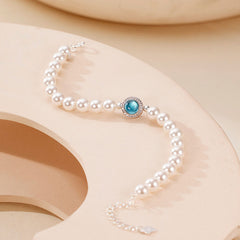 Luxuriöses Charm-Armband mit Süßwasserperlen und Zirkonia und Aquamarin-Kristallen