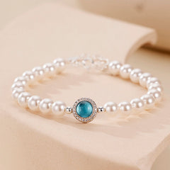 Luxuriöses Charm-Armband mit Süßwasserperlen und Zirkonia und Aquamarin-Kristallen
