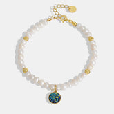 Charm-Armband aus Sterlingsilber mit natürlichen Barockperlen und Quarz