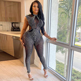 Combinaison moulante sans manches à empiècement en maille transparente et détails en cristal scintillant