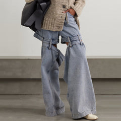 Jean hybride taille basse style vintage à découpes fendues et jambes larges effet vieilli