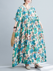 Robe à fleurs imprimée à smocks pour le déjeuner sur la plage