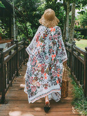 Robe de plage mi-longue en mousseline de soie multicolore à imprimé floral