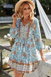 Robe bohème à volants avec nœuds et pompons