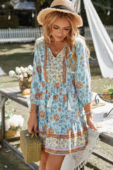 Robe bohème à volants avec nœuds et pompons