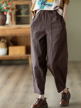 Pantalon sarouel décontracté ample à taille élastique en coton de couleur unie