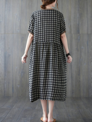 Robe de soirée mi-longue à manches courtes avec poche latérale