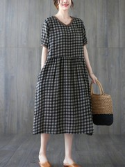 Robe de soirée mi-longue à manches courtes avec poche latérale