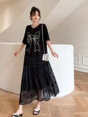 Robe d'été décontractée noire à col rond et manches courtes en forme de A