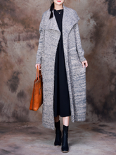 Manteau tricoté classique avec ceinture et revers de trench
