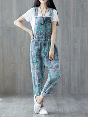 La réalité est fausse Salopette en jean à bretelles imprimées déchirées