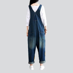 Jeans-Jumpsuit für Damen mit gelbem Saum