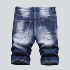 Short en jean déchiré à moustaches pour homme