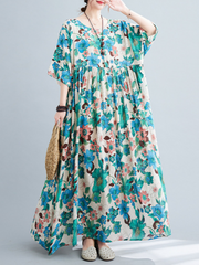 Robe à fleurs imprimée à smocks pour le déjeuner sur la plage