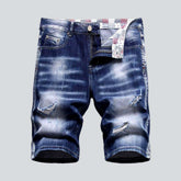 Zerrissene Herren-Jeansshorts mit Schnurrbartmuster