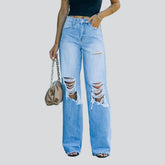 Jean femme à jambe large et effet usé