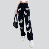 Jean noir femme avec papillons