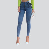 Jean skinny pour femme avec cordons de serrage