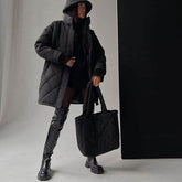 Oversize-Pufferjacke mit Rautensteppung und langen Ärmeln - Schwarz