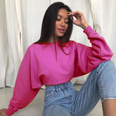 Oversized Cropped Sweatshirt mit überschnittenen Schultern und langen Ärmeln und Stehkragen - Pink