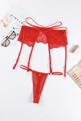 Roter Strumpfgürtel mit Spitzenriemen und Tanga