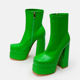 Bottines à talons hauts et plateformes épaisses en cuir verni de couleur unie - Vert