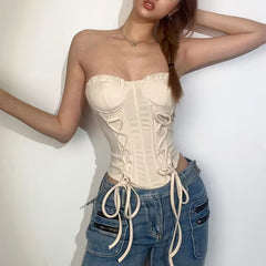 Haut corset court tube en satin à lacets pailletés et décolleté en cœur sans manches