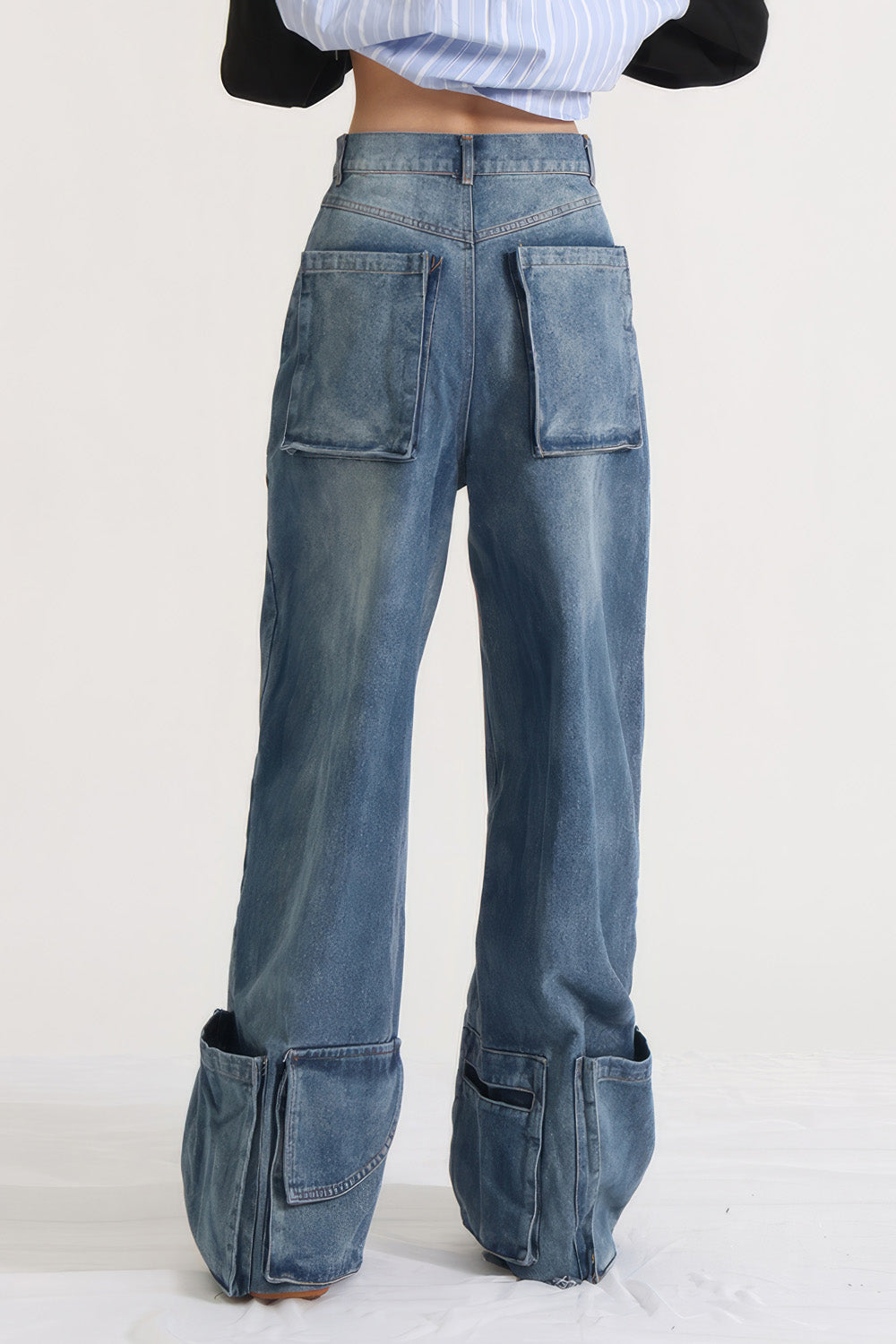 High Waist Jeans mit Taschen am Saum - Blau