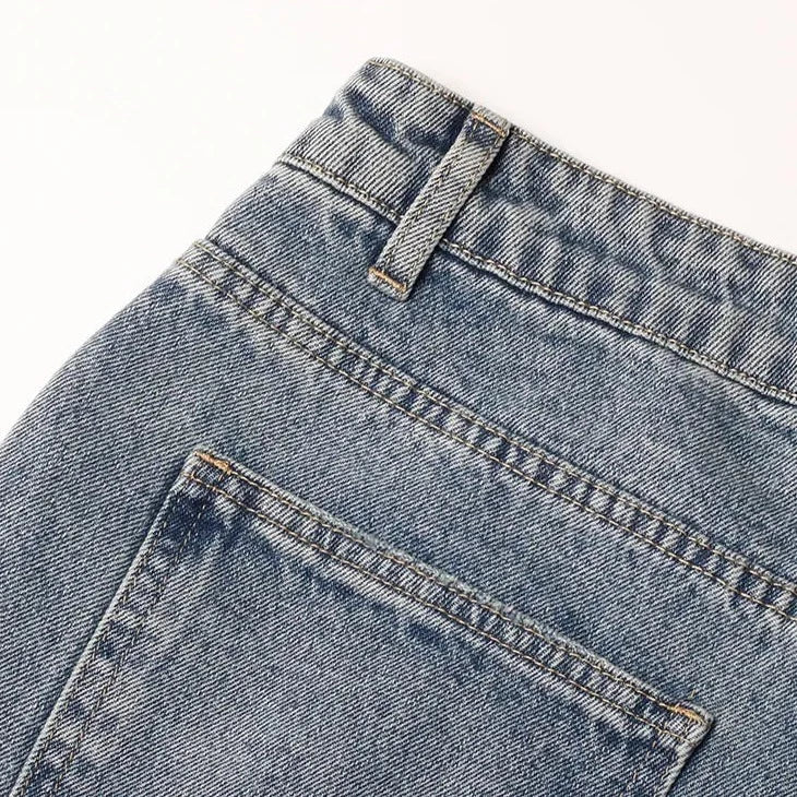 JEANS À FERMETURE IRRÉGULIÈRE