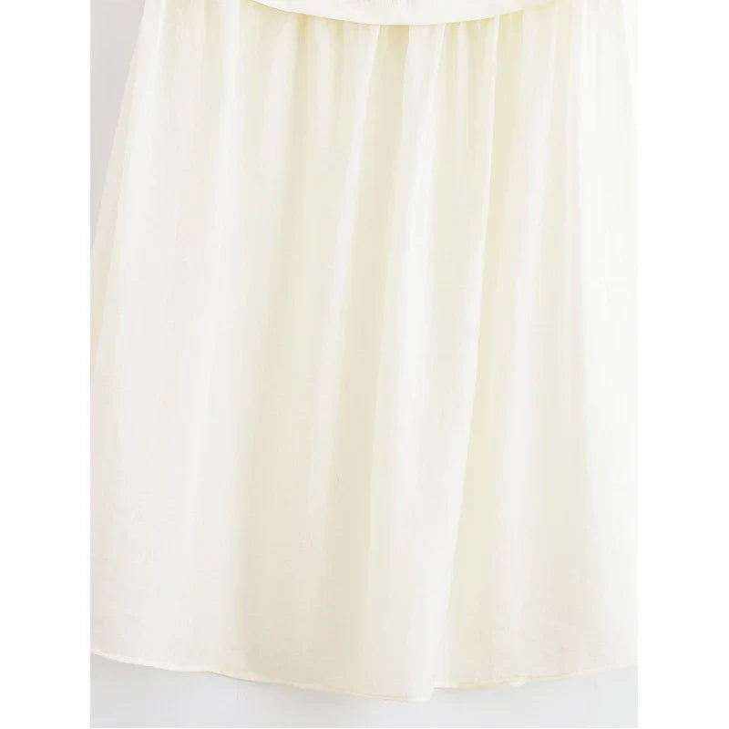 Crème Whirl Dress