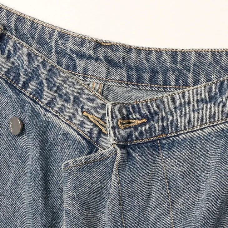 JEANS À FERMETURE IRRÉGULIÈRE