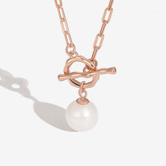 Collier avec pendentif à bascule en perles d'eau douce baroques et lien trombone