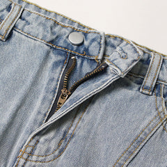 Cooler, einfarbiger, mehrlagiger Jeans-Skort mit sichtbaren Nähten und hoher Taille