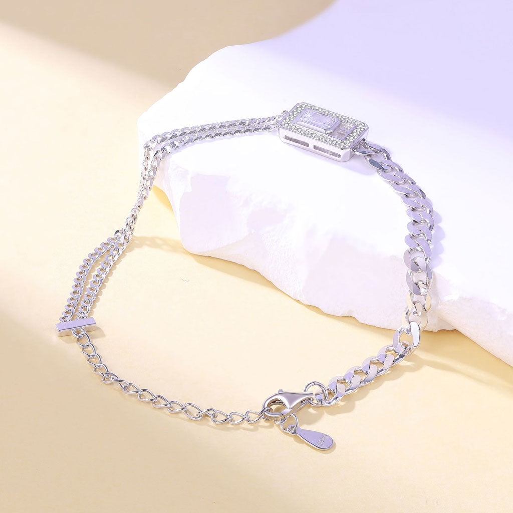 Armband mit drei kubanischen Gliedern und Pavé-Baguettes und runden Zirkonia