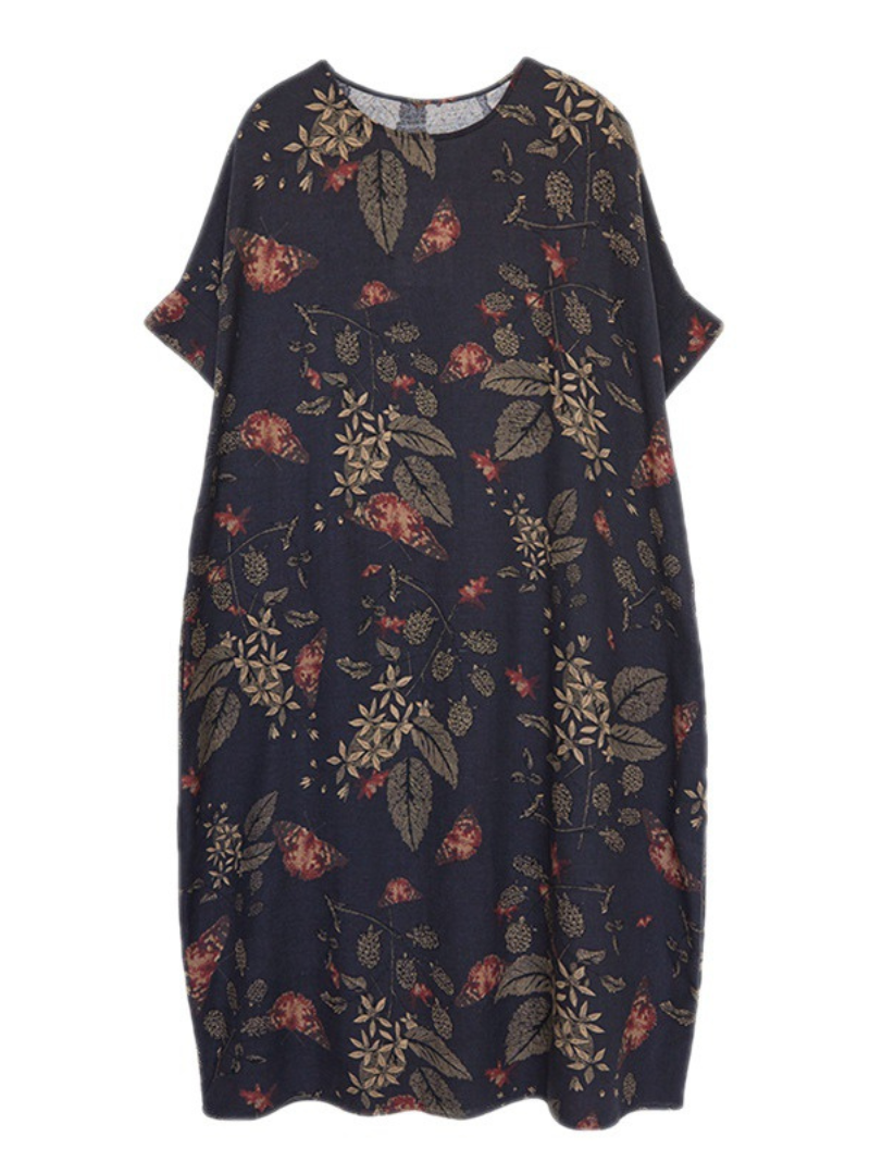 Kurzes, ausgestelltes Kleid mit Puffärmeln und gesmokten Taillen