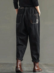 Pantalon de jogging en denim noir avec taille élastique patchwork