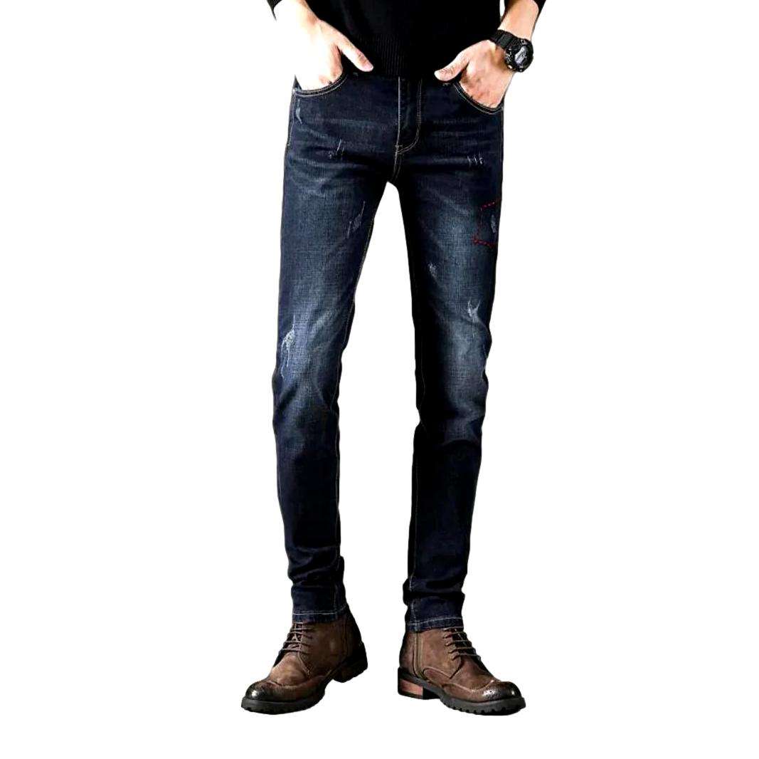 Jean skinny à moustaches pour homme