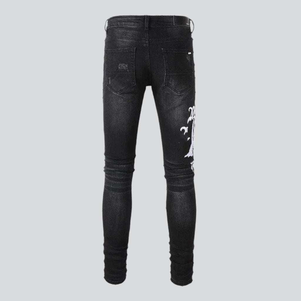 White embroidery black skinny jeans