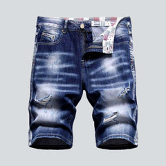 Short en jean déchiré à moustaches pour homme