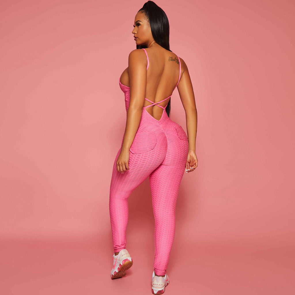 Athletischer Jumpsuit mit tiefem V-Ausschnitt und gekreuztem Rücken und Wabenmuster - Pink