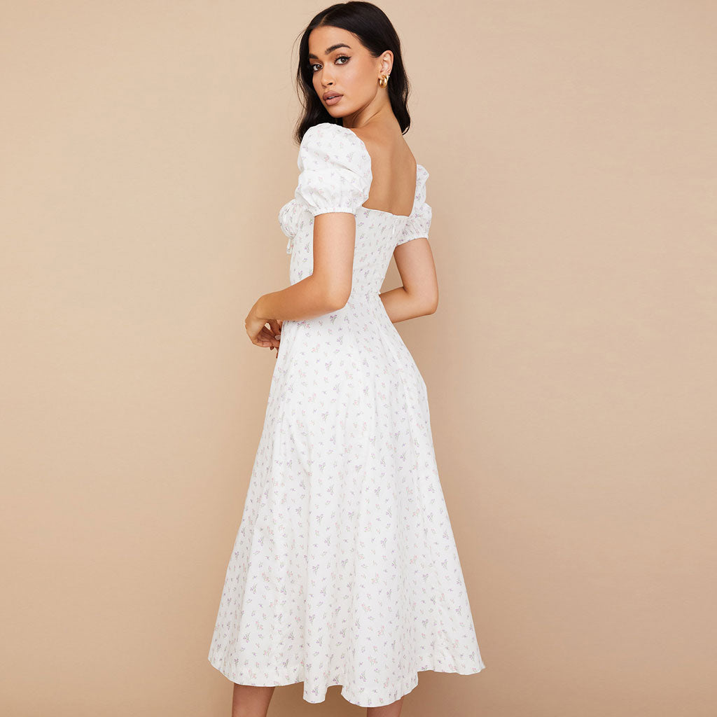 Robe longue d'été à manches bouffantes et fente haute à imprimé marguerites - Blanc