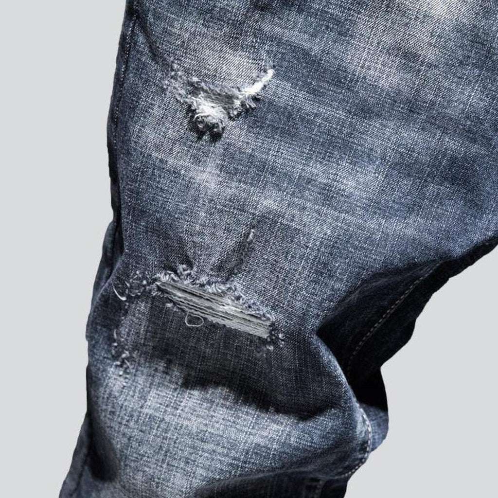 Washed men's ripped jeans